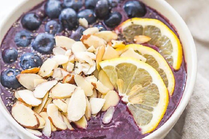 fruits, berries and nuts breakfast bowl